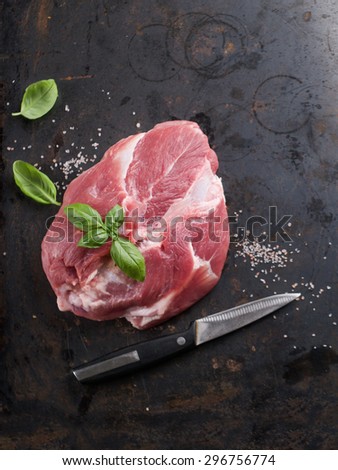 Raw fresh meat with basil, selective focus