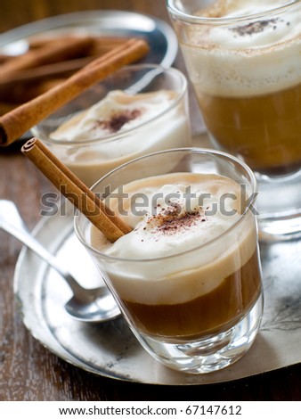 Për ty sipër... - Faqe 13 Stock-photo-cafe-latte-in-glasses-with-cinnamon-stick-on-plate-67147612