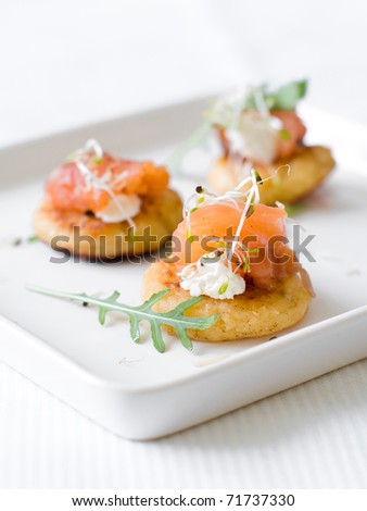 Pancake with smoked salmon, cream cheese and sprouts