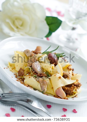 Pasta with tuna and olive served for dinner