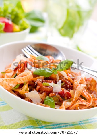Tagliatelle pasta with tomato and vegetable sauce