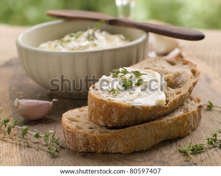 Cheese dip with olive oil and two bread slices. Selective focus