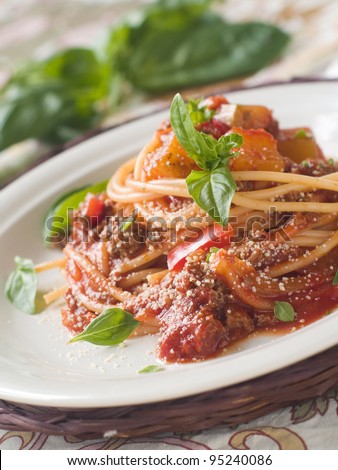 Spaghetti with meat and vegetable sauce, selective focus