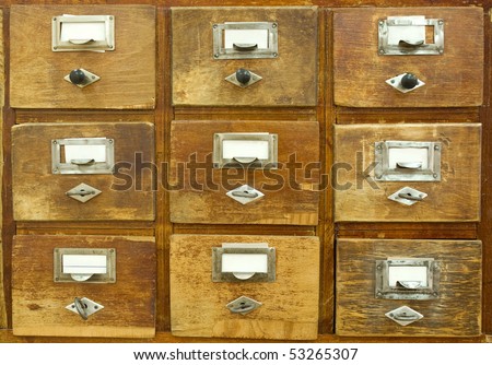 Vintage wooden drawer with blank labels