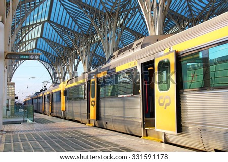 LISBON, PORTUGAL - SEPTEMBER 24, 2015: Urban train at the platform of modern Oriente railway station designed by Santiago Calatrava