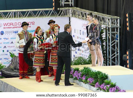 KYIV, UKRAINE - MARCH 18: Alina Maksymenko and Anna Rizatdinova (Ukraine) get silver medals of Deriugina Cup (Rhythmic Gymnastics World Cup) on March 18, 2012 in Kyiv, Ukraine