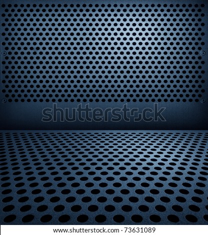 Background sheet of metal covered with lines of circular holes.