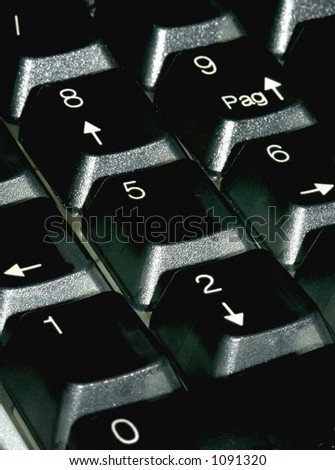 macro of a numeric pad with black keys