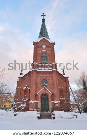 Jyvaskyla, Finland. Lutheran Cathedral on the background of the early winter sunset
