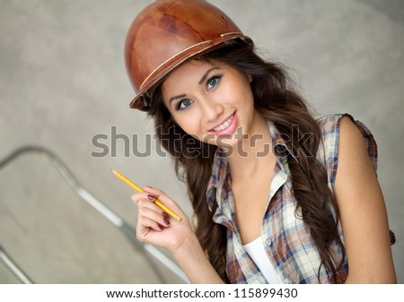 Painting worker looking at brushes before work