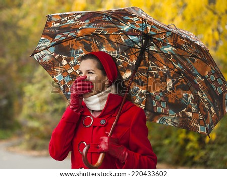Woman looking away and cover her face