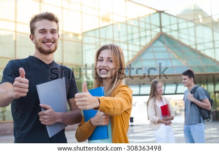 Group of cheerful student show education success thumb up