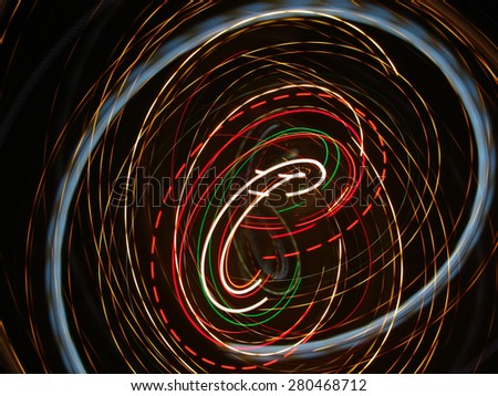 Camera toss abstract composition, light trails, arc, circle, smooth curves. Photographed with a digital camera in a free flight.