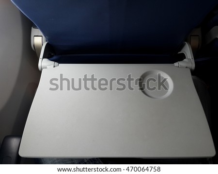 Airplane tray table on seat back ,selective focus