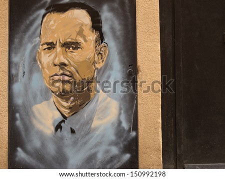 BARCELONA - JULY 18: Graffiti in honor Tom Hanks on July 18, 2013 in Barcelona, Spain. Tom Hanks is the only author who has won 2 row Oscars for Best Actor in second half XXth c.