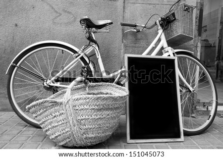 Nostalgia of the past when the board, bicycle, and wicker replaced the touch screen, SUV and plastic.