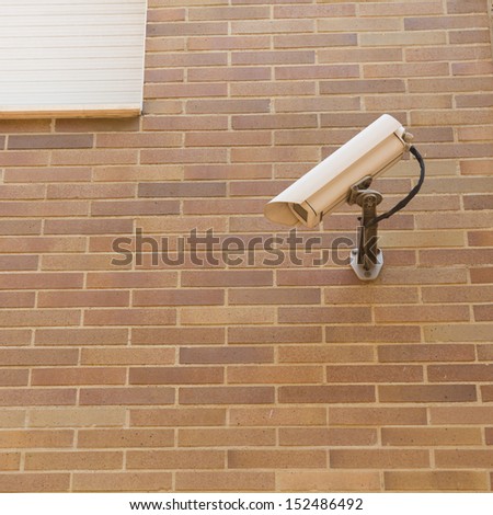 security camera on a wall. the control anti-theft.