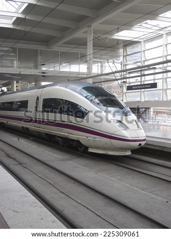 MADRID Ã?Â¢?? FEB 21: High speed train in Atocha Station on February 21, 2013 in Madrid, Spain. Spain\'s main cities are connected by high-speed trains.