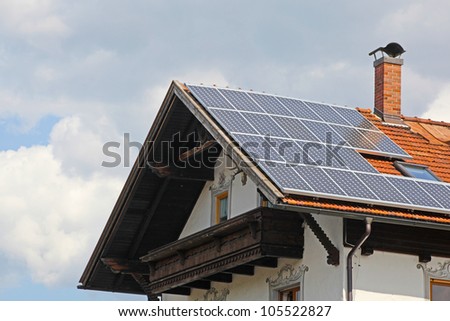 Solar panels on the roof of te small house