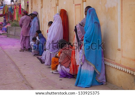 JAIPUR, INDIA - MARCH 17:People covered in paint on Holi festival, March 17, 2013, Jaipur, India.Holi, the festival of colors, marks the arrival of spring, being one of the biggest festivals in India