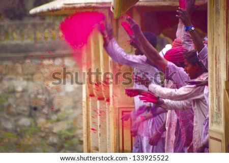JAIPUR, INDIA - MARCH 17:People covered in paint on Holi festival, March 17, 2013, Jaipur, India. Holi, the festival of colors, marks the arrival of spring, one of the biggest festivals in India