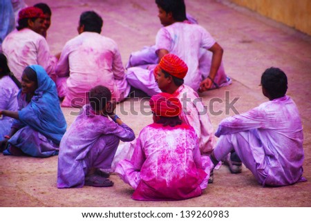 JAIPUR, INDIA - MARCH 17: People covered in paint on Holi festival, March 17, 2013, Jaipur, India. Holi, the festival of colors, marks the arrival of spring, one of the biggest festivals in India