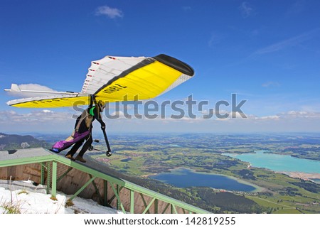 TEGELBERG, GERMANY - MAY 16: Competitor Conrad Duvig from Austria of the King Ludwig Championship hang gliding competitions takes part on May 16, 2012 in Tegelberg, Germany
