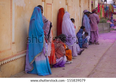 JAIPUR, INDIA - MARCH 17: People covered in paint on Holi festival, March 17, 2013, Jaipur, India. Holi, the festival of colors,  the arrival of spring, being one of the biggest festivals in India