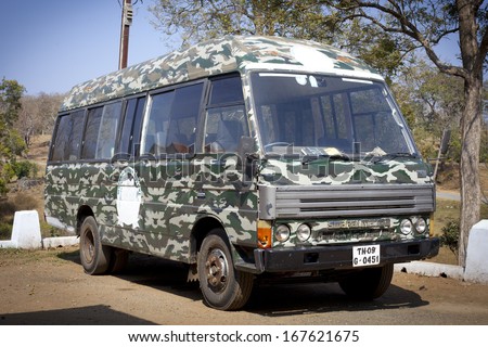 MUDUMALAI, INDIA - JANUARY 10: Tracking bus in Mudumalai National Reserve on January 10, 2013 inTamil Nadu, India.