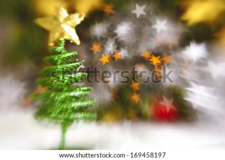 Beautiful toy  of the christmas tree on abstract background