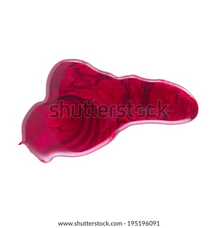 Red nail polish drops sample, isolated on white