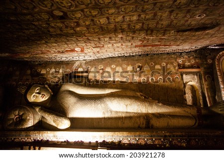 DAMBULLA, SRI LANKA - March 27, 2014: Cave temple. It has five caves under a vast overhanging rock and dates back to the first century BC. Dambulla Rock Temple is a Unesco World Heritage Site.