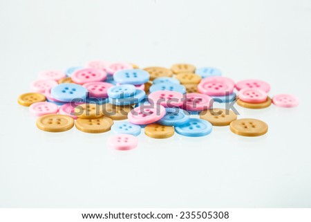 Group of pink, blue and yellow  Buttons