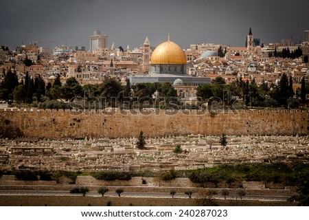 golden Dome of the Rock and church steeples on the skyline of the Old City of Jerusalem.