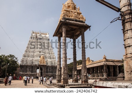 KANCHIPURAM, INDIA -  Jan 18 - Indian tourists explore ancinet temples of the Five Rathas on January 18, 2013 in Kanchipuram, India