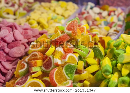 assortment colorful gummy candies at market