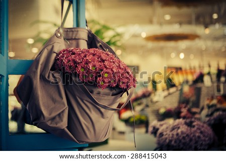 violet flowers in bag