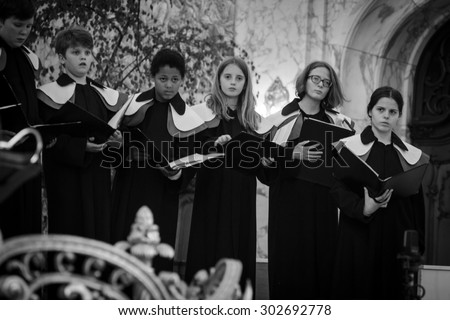 HAMBURG, GERMANY - MAY 29: Members of child Choir (EST) sing at the St. Michael Church -  - one of the well known landmarks of Hamburg, May 29, 2015 in Hamburg, Germany