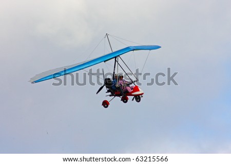 CRIMEA, UKRAINE - SEPTEMBER 9: Competitor of the motor hang gliding competitions taking part on the Klementieva mountain on September 9, 2010 in Crimea, Ukraine