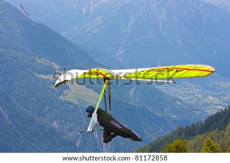 FIESH, SWITZERLAND - JULY 8: Competitor of the Fiesh Open  hang gliding competitions takes part  on July 8, 2011 in Fiesh, Switzerland