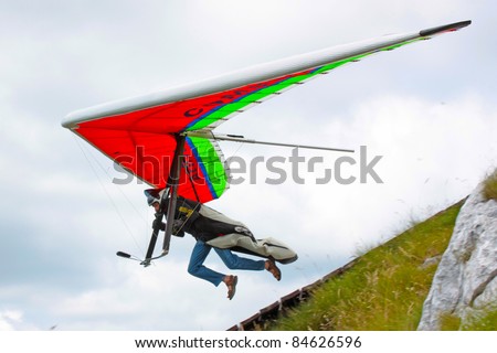 ROC, CROATIA - JUNE 29: Competitor takes part in the Croatian Open hang gliding competitions takes part on June 29, 2011 in Roc, Croatia