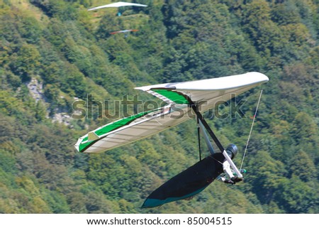 TOLMIN, SLOVENIA - AUGUST 21: Competitor  takes part in the Kobala Open-2011 hang gliding competitions on August, 2011 near Tolmin, Slovenia