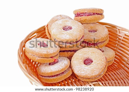Many cherry bakery cakes in the basket