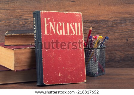 learning english concept. book on a wooden background