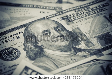 Stack of US Dollars backround. Notes face value of 100 US dollars