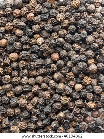 closeup of black peppercorns background