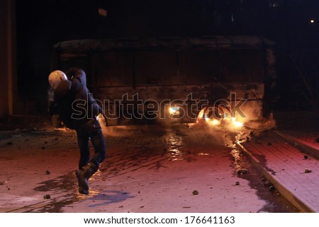 A protester throws stones at police. Kyiv, Ukraine, January 19, 2014
