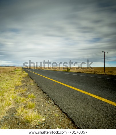 dirt road leading into distance