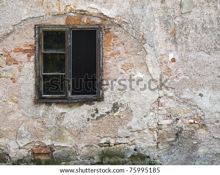 old dirty window on old dirty wall
