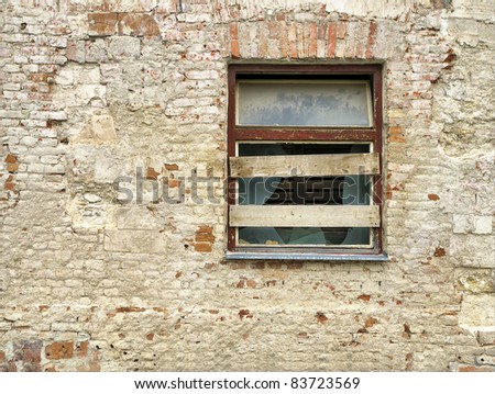 old dirty window on old dirty wall